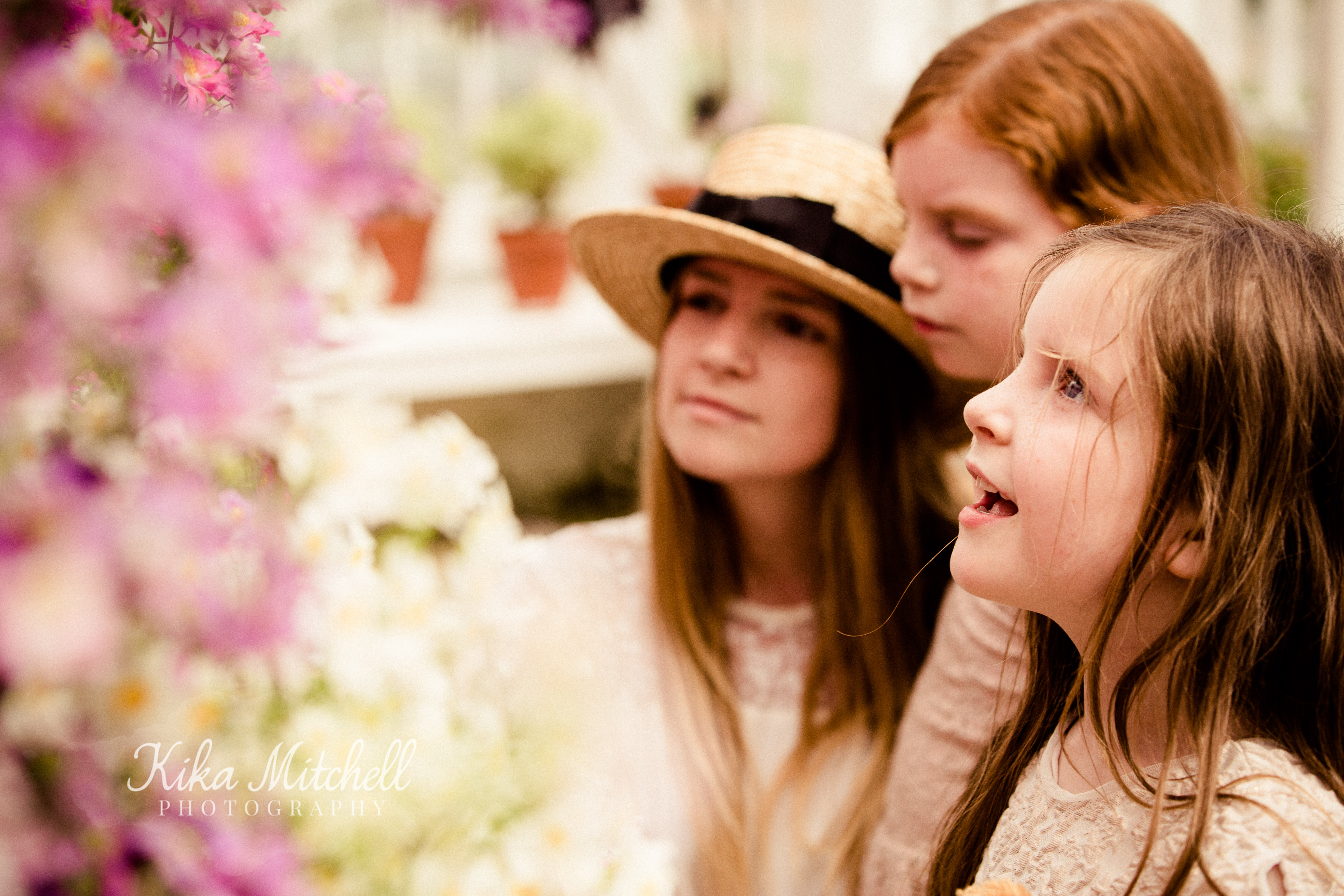 Keri-Anne Gingerlillytea and daughter in flowers in greenhouse by Kika Mitchell photography Chelmsford