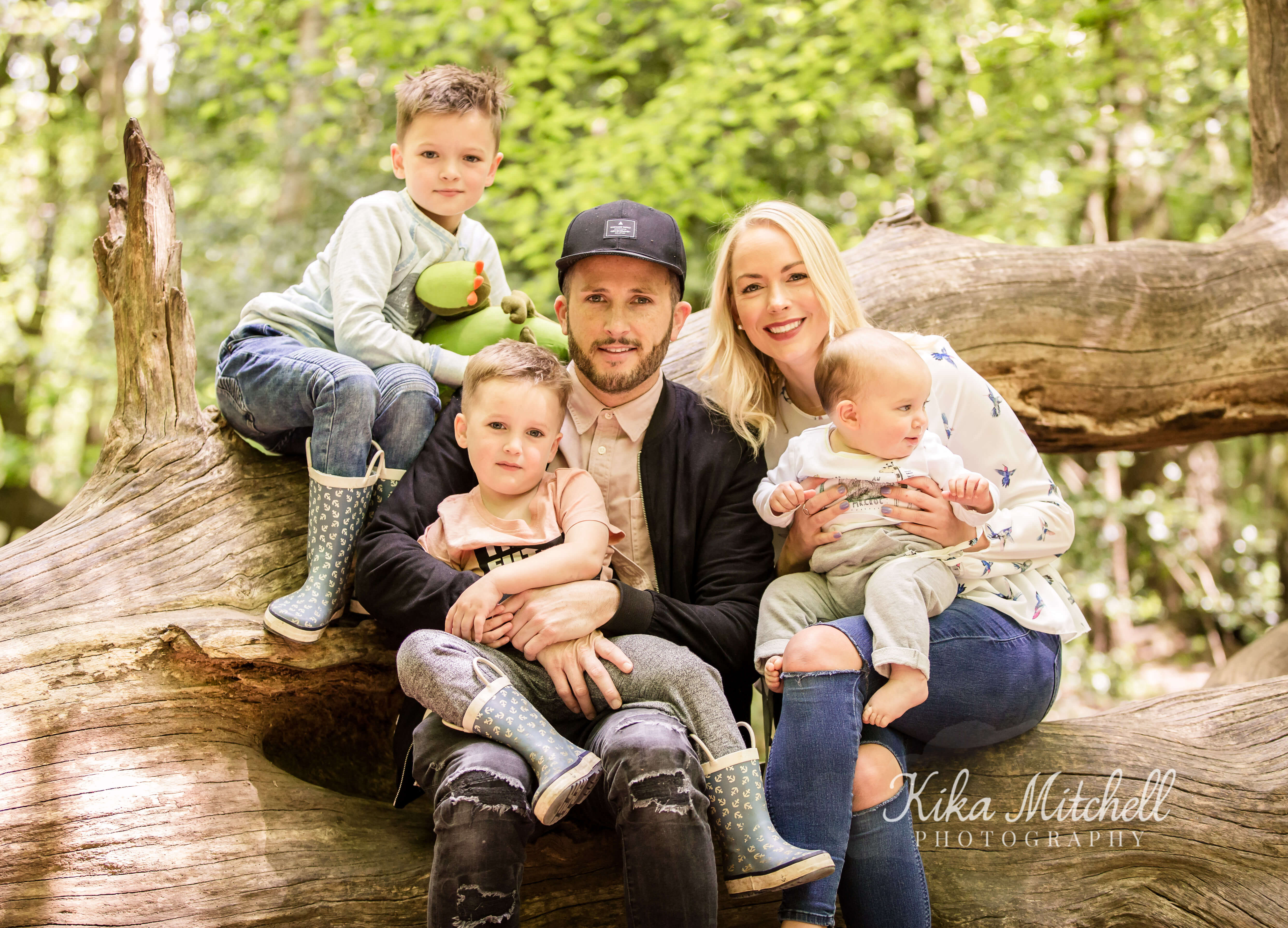 Emily Norris Youtube vlogger and sensation with her young family in woodland location in Chelmsford on a family photoshoot by Chelmsford photographer Kika mItchell Photography