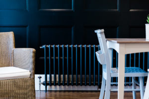 radiator, table and dark blue black wall photographed by Chelmsford photographer Kika Mitchell featured in Our dream kitchen blog