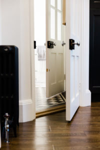 doorway featuring radiator and chequerboard floor in Our dream kitchen blog