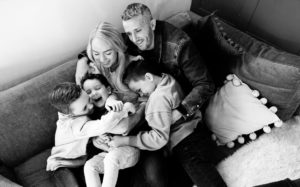 Emily Norris and her family on latest shoot in black and white shot on sofa taken by chelmsford photographer Kika Mitchell Photographer