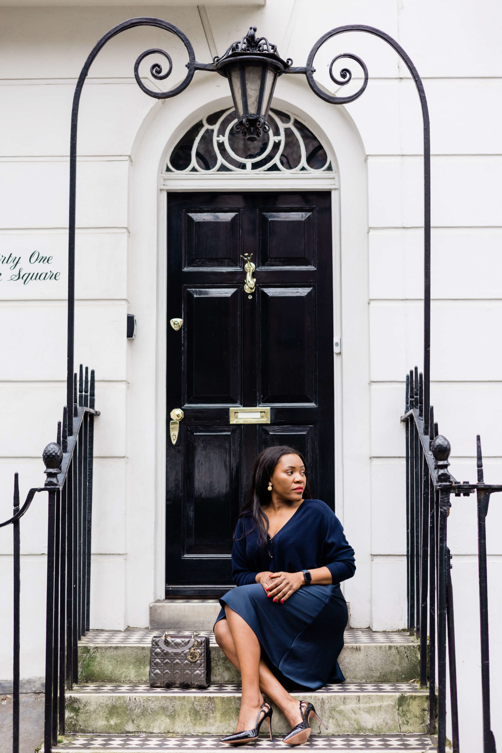 London branding shoot by Kika mItchell Photography, woman sat on step outside chelsea house