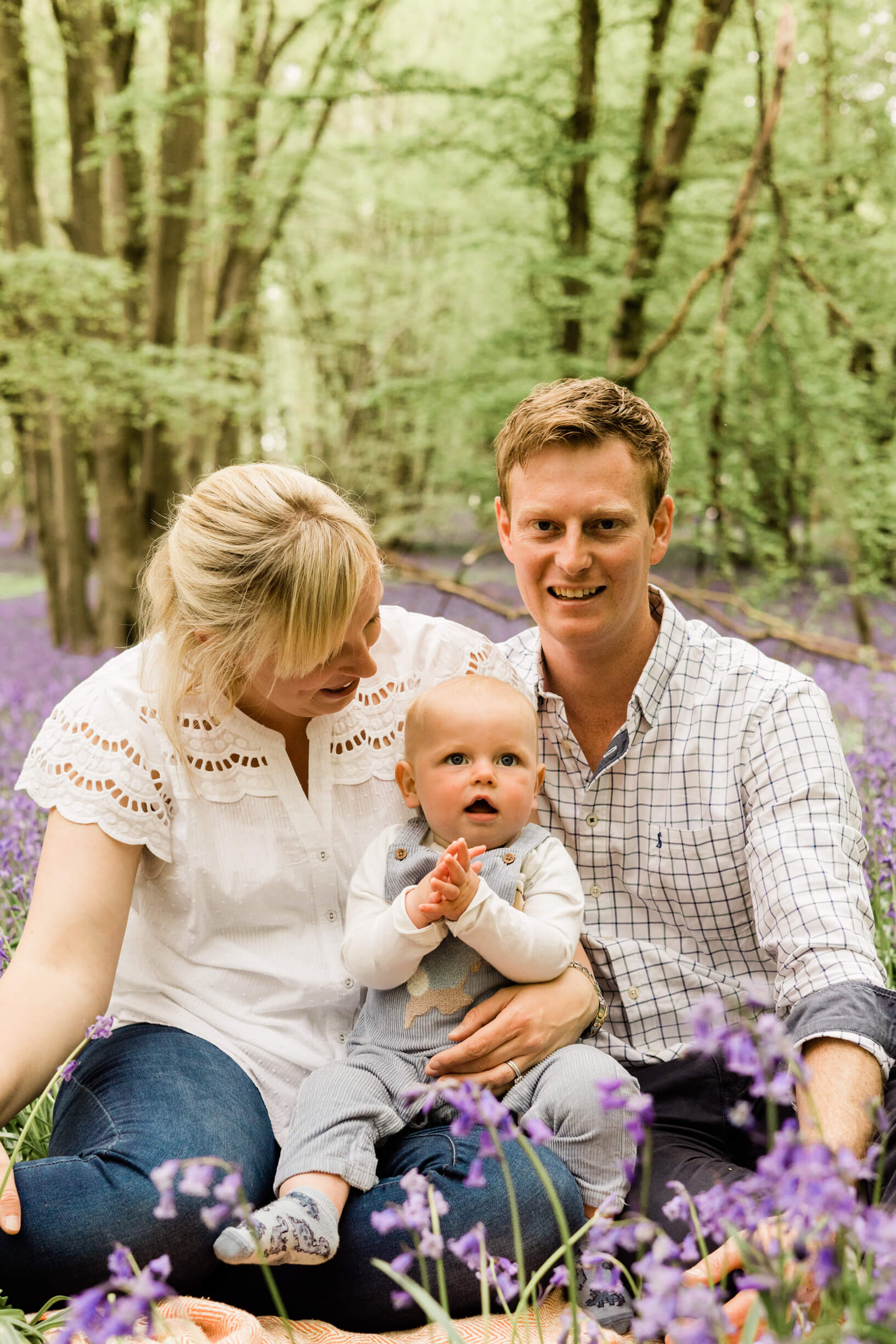 Relaxed family photography shoot in the spring bluebells captured by Chelmsford Photographer Kika Mitchell Photography