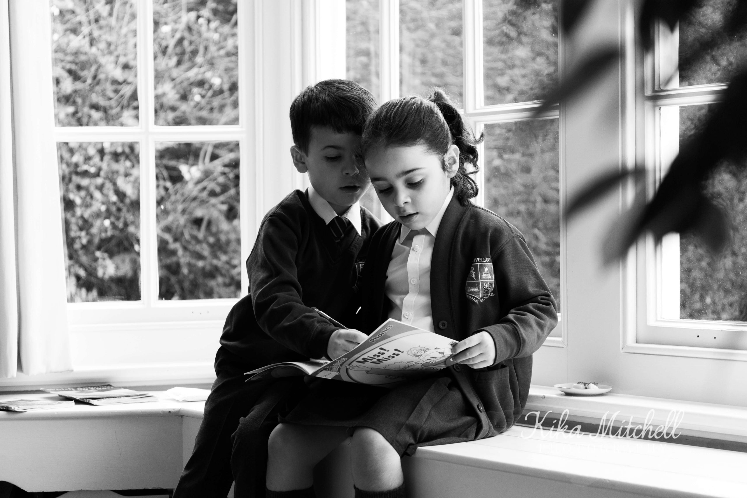 black and white sibling school photo