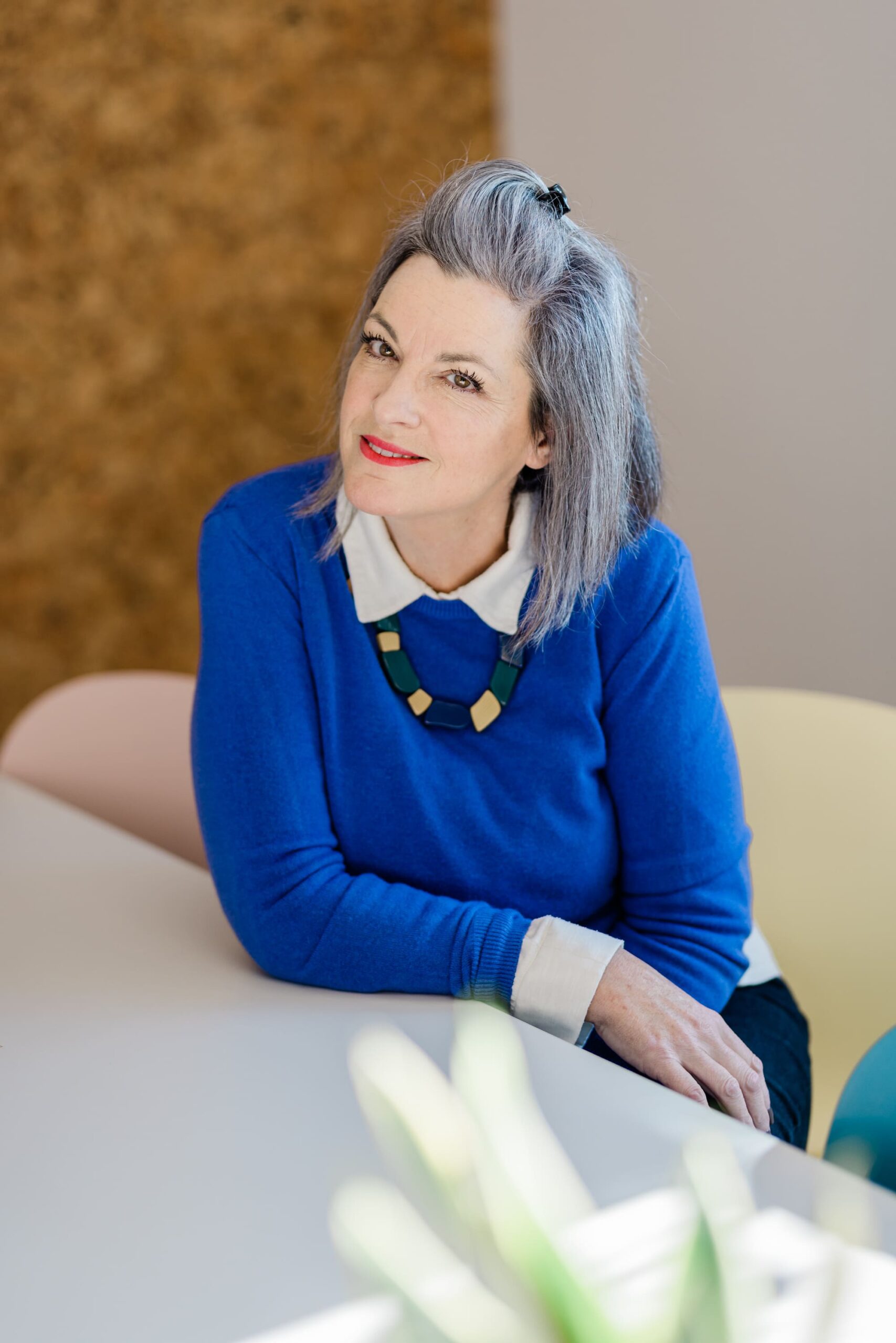 Kika Mitchell Photography Corporate headshot of Emma Bradford in blue jumper, Chelmsford photographer